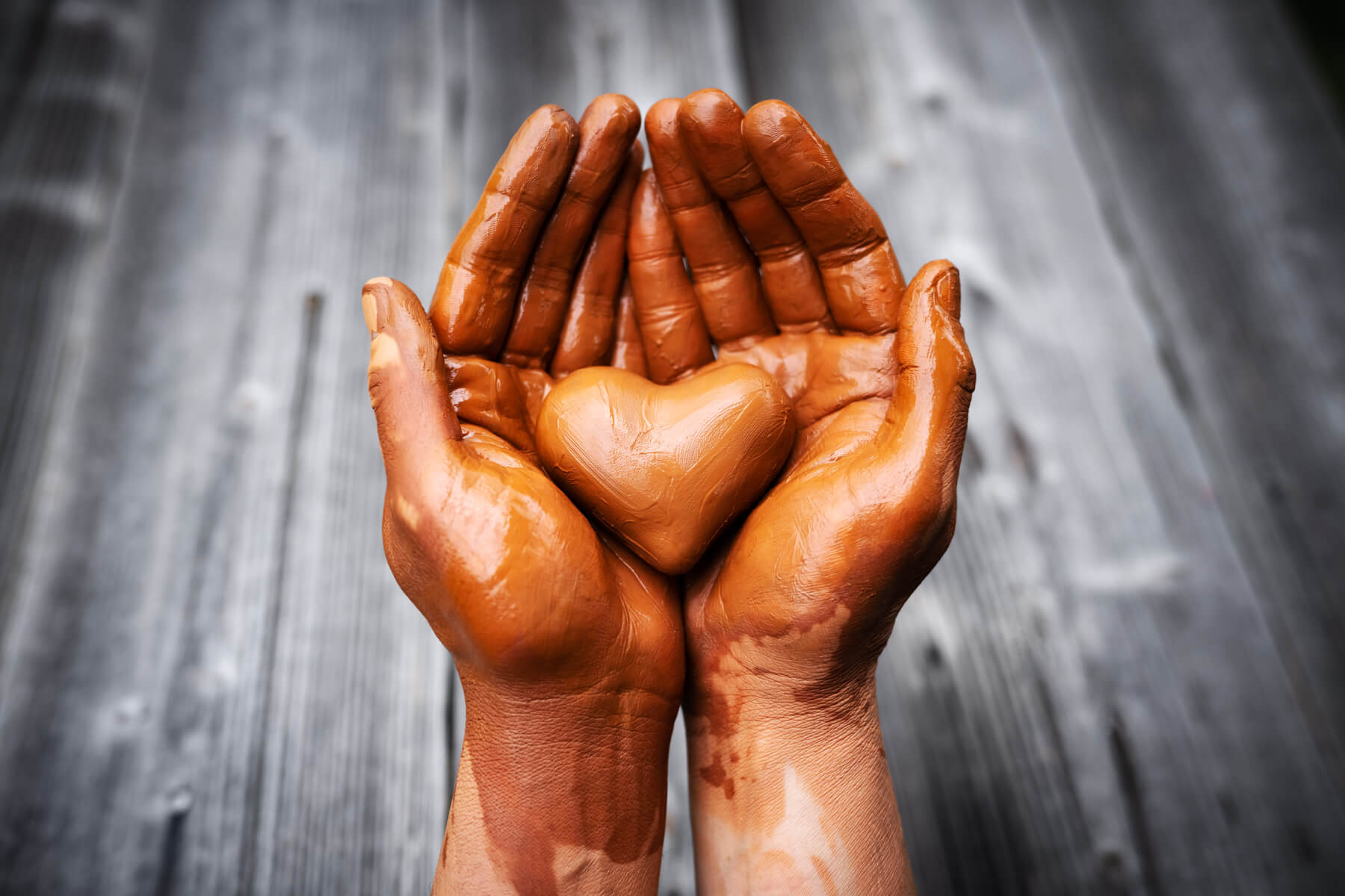 heart made of potter 39 s clay in the hands of a 2023 11 27 05 20 29 utc
