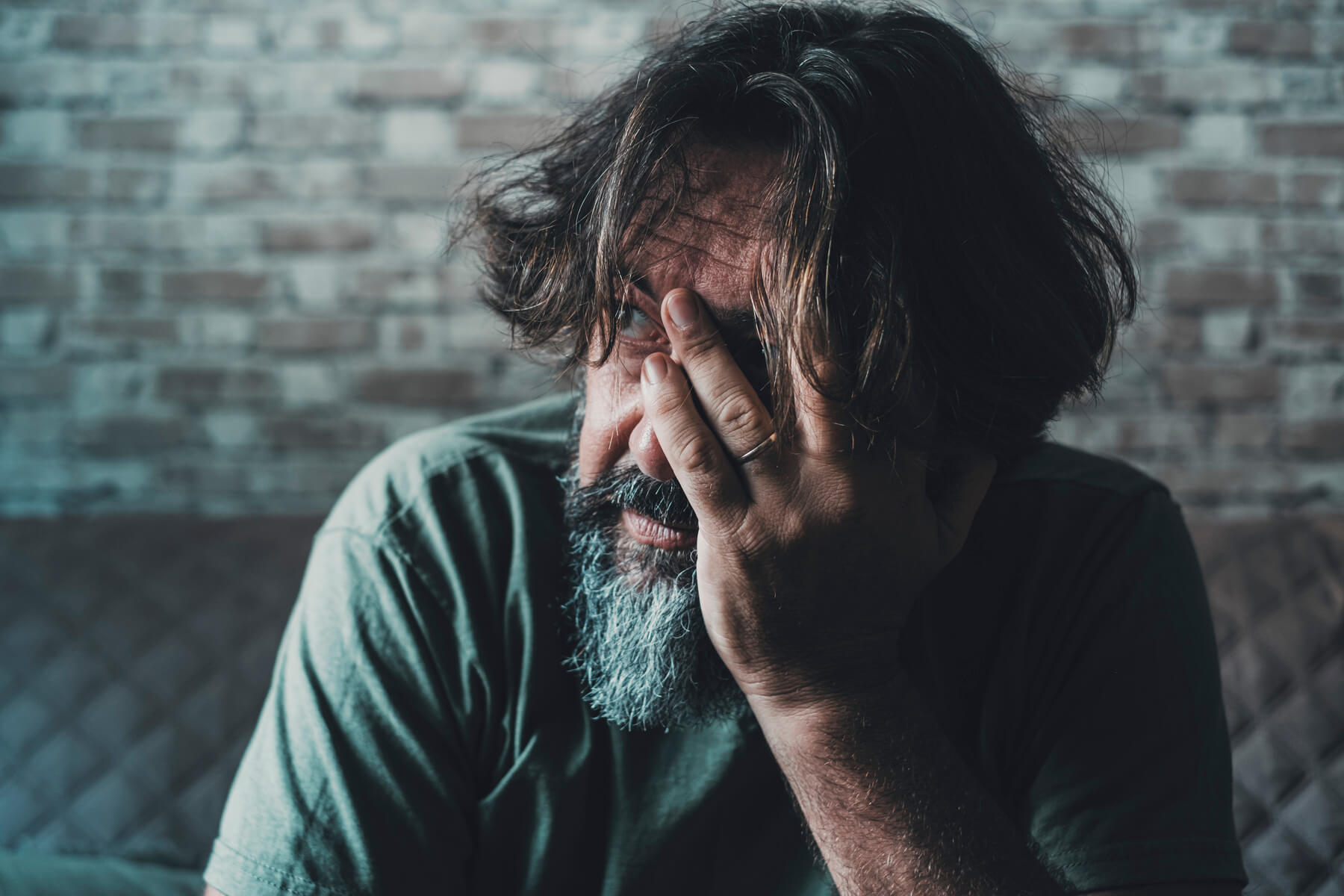 desperate and stressed man touching his face with 2023 11 27 05 24 00 utc